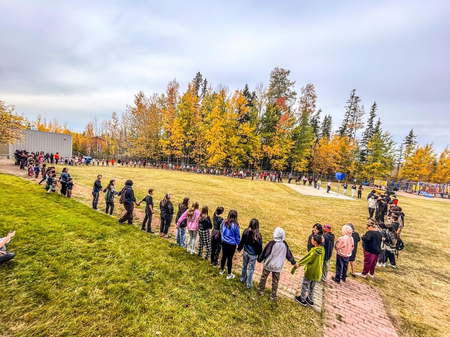 Anzac students and staff joined together in a round dance.