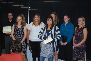 Deborah Gladue-McLeod (middle) celebrates with other Edwin Parr nominees