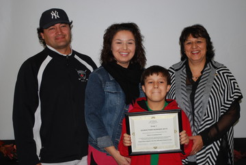 Left to right: Kelly Cunningham, Erica Cunningham, Noah Cunningham, Barb Laderoute, Gift Lake School Principal 