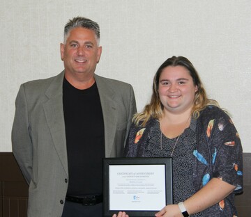 Left to right: Cal Johnson, Associate Superintendent, Brittney Lyon, Edwin Parr Teacher Award nominee