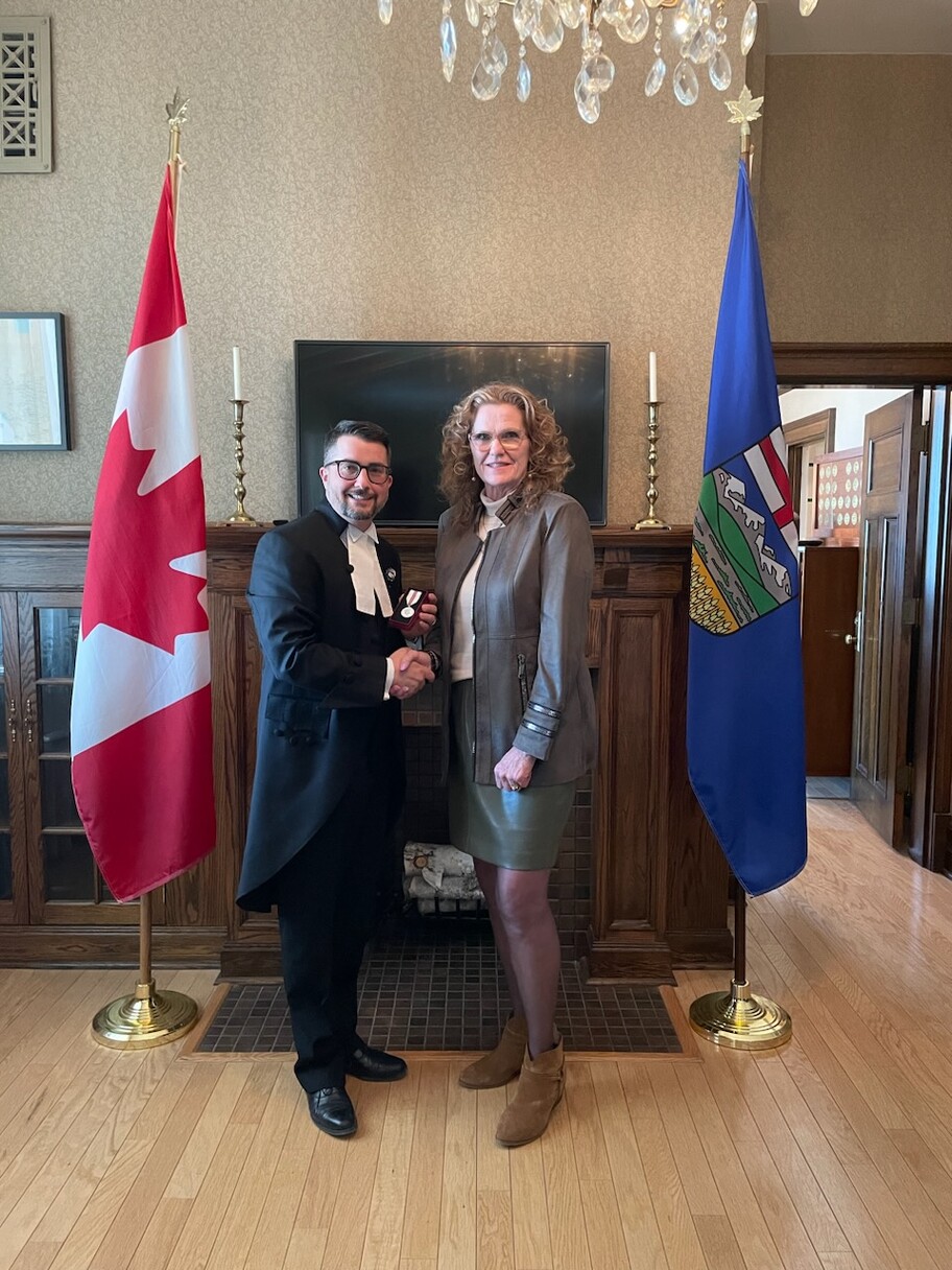 Left to Right: Honourable Nathan Cooper and Dr. Nancy Spencer-Poitras